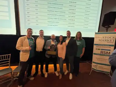 image of a group of adults receiving a trophy